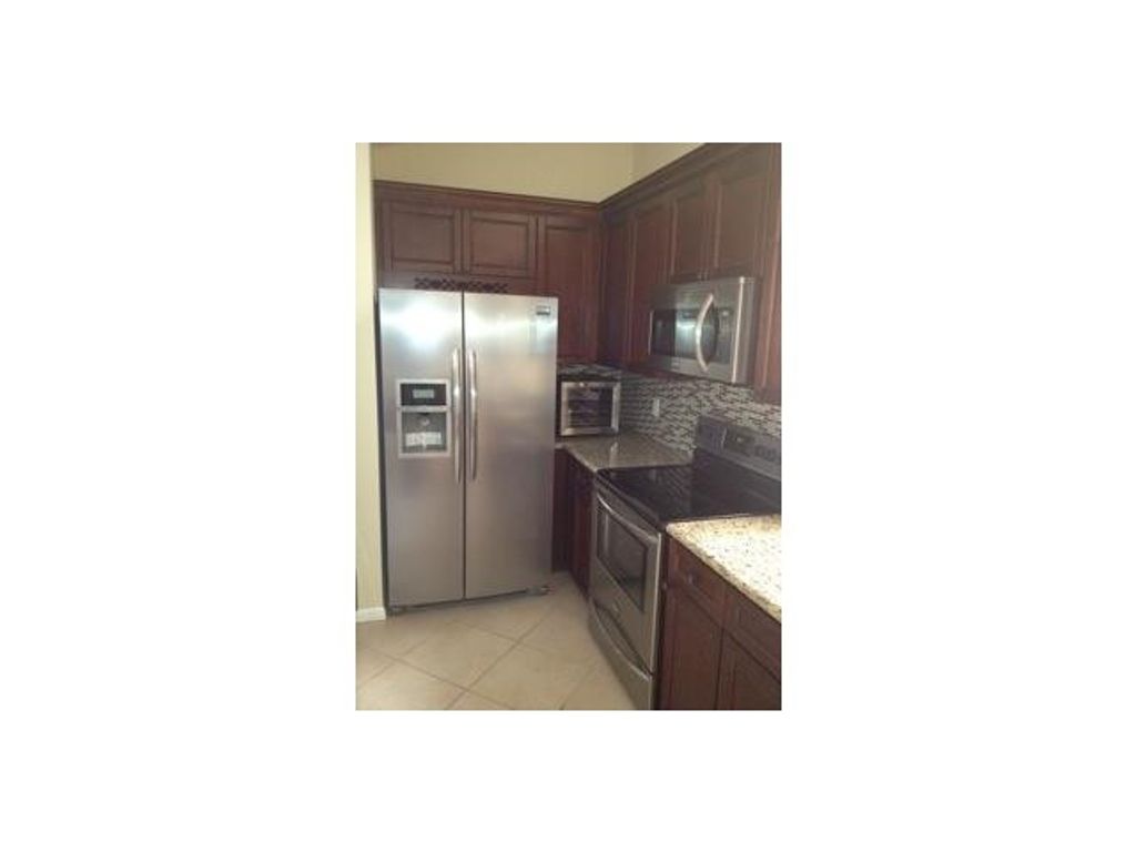 Photo of 134 NW 98th Terrace, Plantation, FL 33324 (MLS # B26021036)