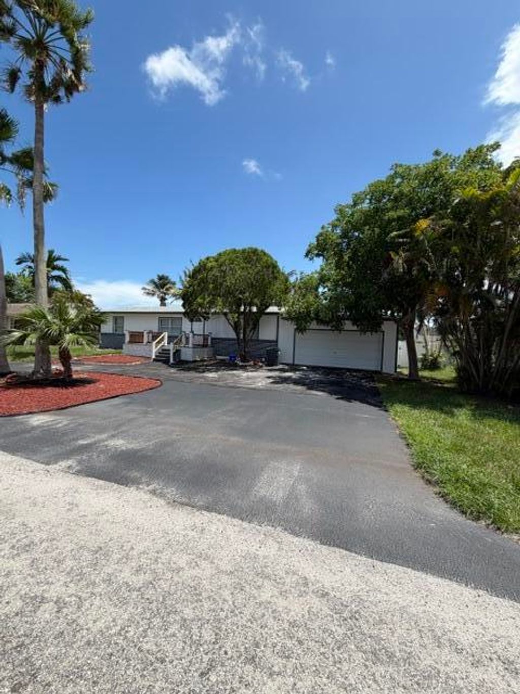 Photo of 3040 TROPICAL Trail, Lake Worth, FL 33462 (MLS # B26053318)