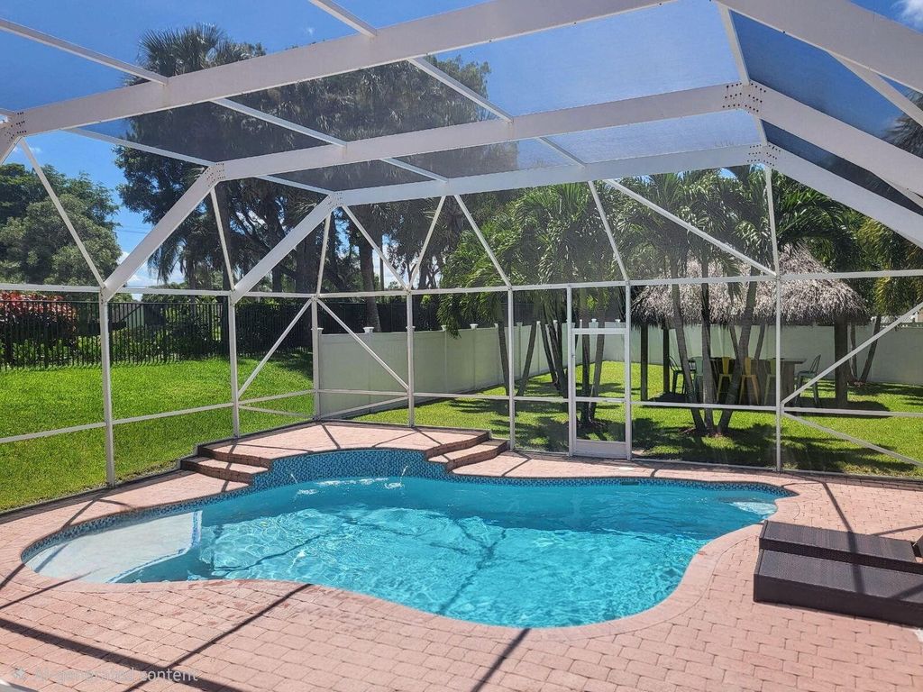 Photo of 1261 Gembrook Court, West Palm Beach, FL 33411 (MLS # R11161776)