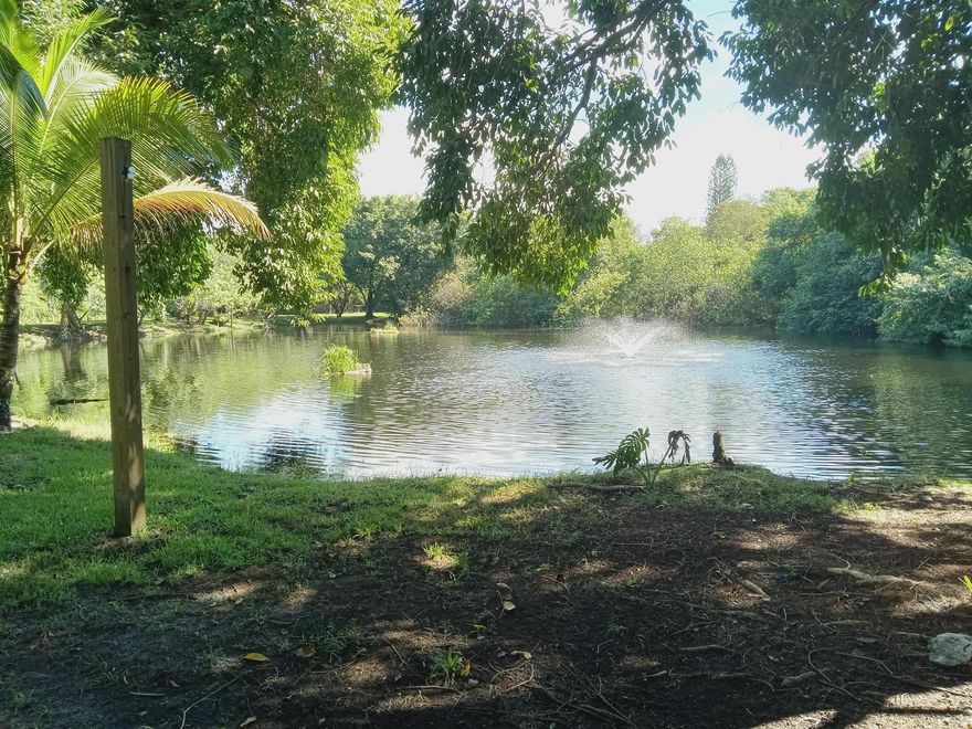 Estate Home on 4.51 acres, 2 Acre Lake, 3 + car garage, large Workshops, Steel Barn, Swimming POOL, Metal Roof, New Kitchen & Bath, New SS Appliances, HUGE Front Porch, You must see this unique property, as word's can not do it justice, Open Houses every weekend , this one of a kind estate will sell FAST,