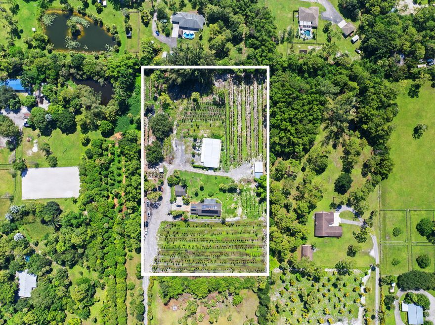 Discover nearly 6 acres of endless possibilities in the highly sought-after Loxahatchee Groves neighborhood—where large parcels with paved road access and private gated entry are a rare find. Currently operating as a thriving agricultural nursery, this property offers exceptional versatility—continue its agricultural success or transform it into your dream equestrian estate, complete with roping arena, stables, and more. The main residence is a solid CBS 3-bedroom, 2-bath home featuring granite countertops, a cozy fireplace, a 2-car garage, and a screened-in porch perfect for enjoying serene evenings. A separate 2-bedroom guest cottage provides ideal accommodations for extended family, caretakers, or rental income.  see more Multiple on-site buildings and carport-style shelters offer abundant space for storage, workshops, or income-producing uses. A powered electric entry gate ensures convenience and privacy, while the expansive, well-laid-out acreage provides room for virtually any lifestyleagricultural, equestrian, or multi-use investment.

Located in the desirable Loxahatchee Groves neighborhood of Palm Beach County, this unique property blends rural charm with modern comfort and unlimited potential.

Highlights:

5.74± acres with paved road access & gated entry

Thriving nursery operation with agricultural zoning

Main home: 3 BR / 2 BA, CBS construction, granite counters, fireplace, screened porch

Guest cottage: 2 BR for rental or guests

Multiple barns/outbuildings & carport shelters

Electric entry gate for security & ease

Endless potential for agricultural, equestrian, or multi-use purposes
