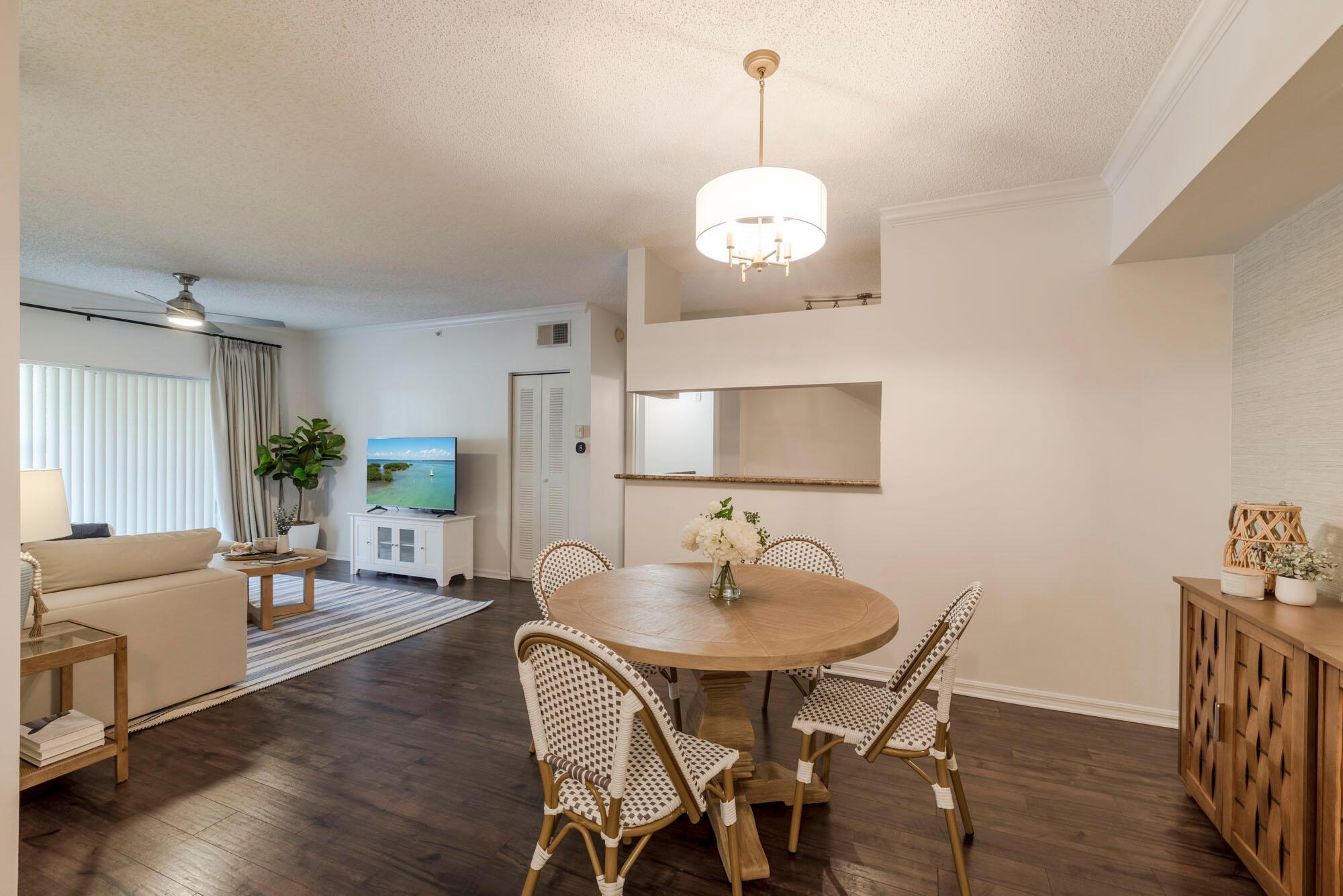 Welcome to resort-style living at Tuscany on the Intracoastal! This beautifully updated and fully furnished 2 bed, 2 bath condo is completely turnkey, just bring your suitcase. The bright, open layout features modern finishes, a sleek kitchen with stainless steel appliances, and spacious bedrooms with ample storage. Enjoy coastal breezes from your private balcony in this gated waterfront community offering luxury amenities including a pool, fitness center, clubhouse, and scenic walking paths along the Intracoastal. Ideally located just minutes from top shops, dining, and entertainment, with easy access to beaches and I-95. Whether you're looking for a full-time residence, seasonal getaway, or investment opportunity, this condo has it all. Special assessments have been paid in full by the