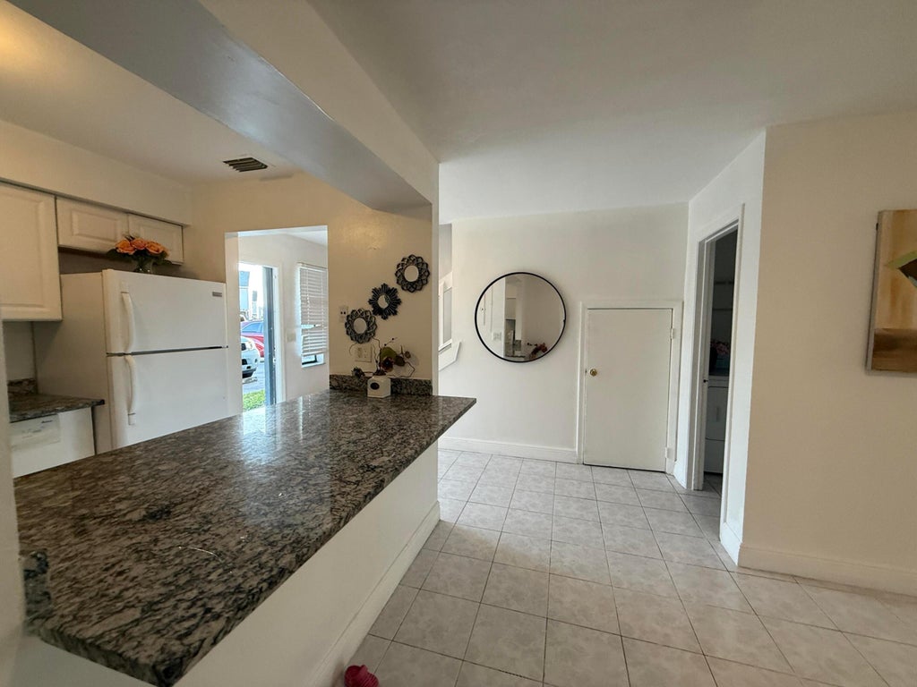 Photo of 5102 Pier Drive, Greenacres, FL 33463 (MLS # R11074264)