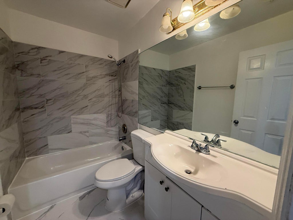 Photo of 5102 Pier Drive, Greenacres, FL 33463 (MLS # R11074264)