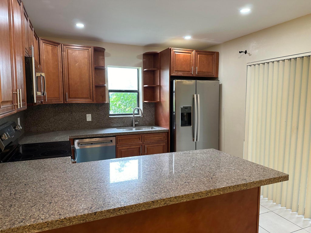 Photo of 7697 Courtyard Run W, Boca Raton, FL 33433 (MLS # B26080246)