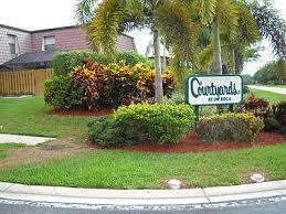 Photo of 7697 Courtyard Run W, Boca Raton, FL 33433 (MLS # B26080246)
