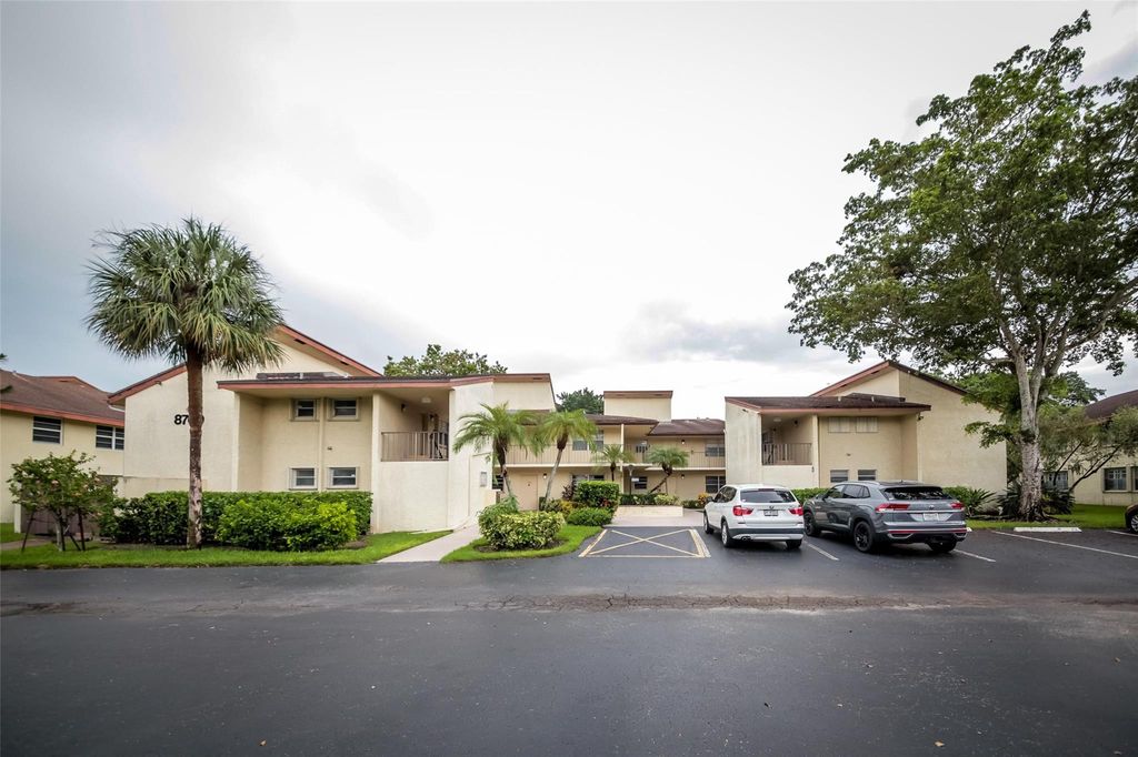 Photo of 8760 Holly Court #104, Tamarac, FL 33321 (MLS # B26031380)