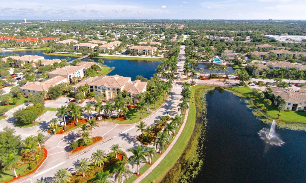 Photo of 3022 ALCAZAR Place #306, Palm Beach Gardens, FL 33410 (MLS # B26081528)