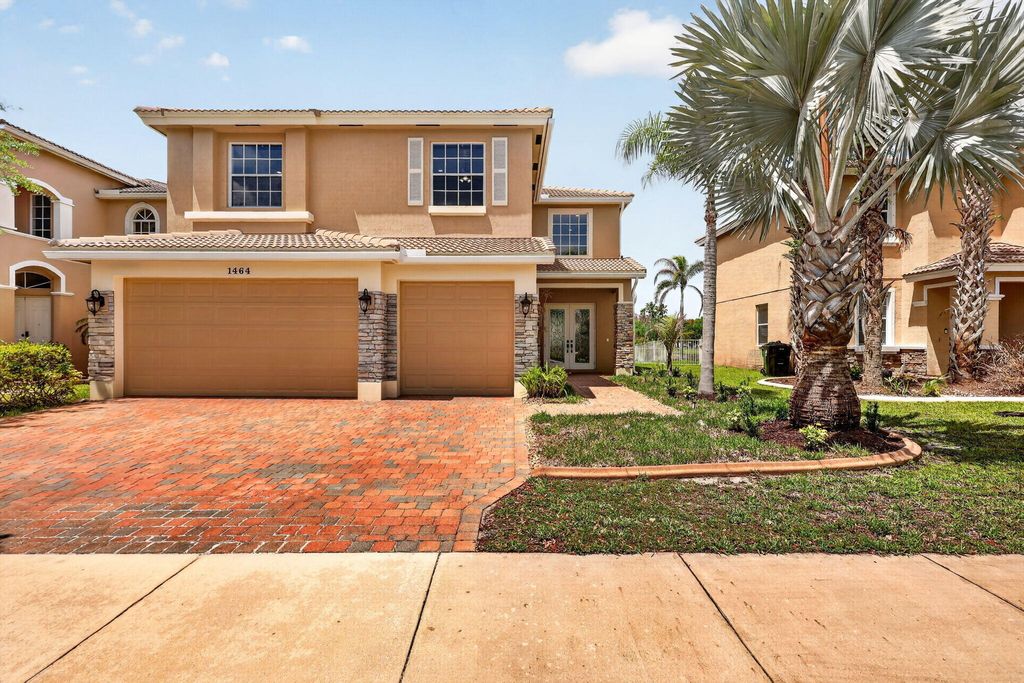 Photo of 1464 NW Leonardo Circle, Port Saint Lucie, FL 34986 (MLS # B26019779)