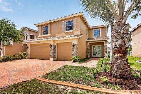 Photo of 1464 NW Leonardo Circle, Port Saint Lucie, FL 34986 (MLS # B26019779)