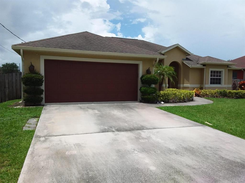Photo of 3838 SW La Fleur Street, Port St Lucie, FL 34953 (MLS # R10817446)