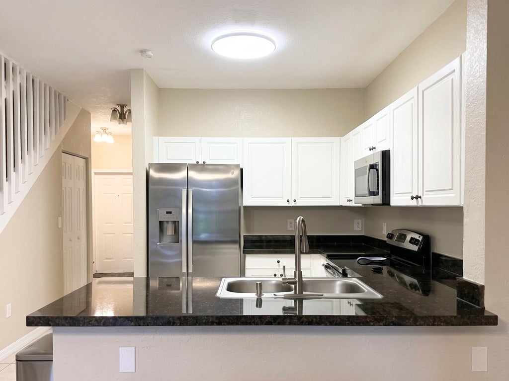 Photo of 7843 CATALINA Circle, Tamarac, FL 33321 (MLS # B26077512)