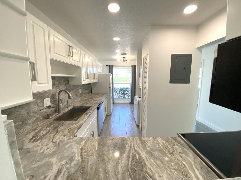 Photo of 2450 Black Olive Boulevard #A, Delray Beach, FL 33445 (MLS # B26036854)