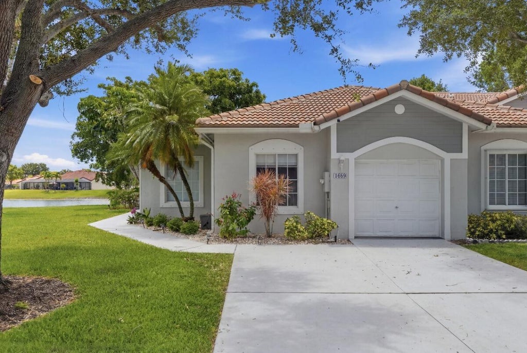 Photo of 1080 SW 42nd Avenue, Deerfield Beach, FL 33442 (MLS # B26047662)