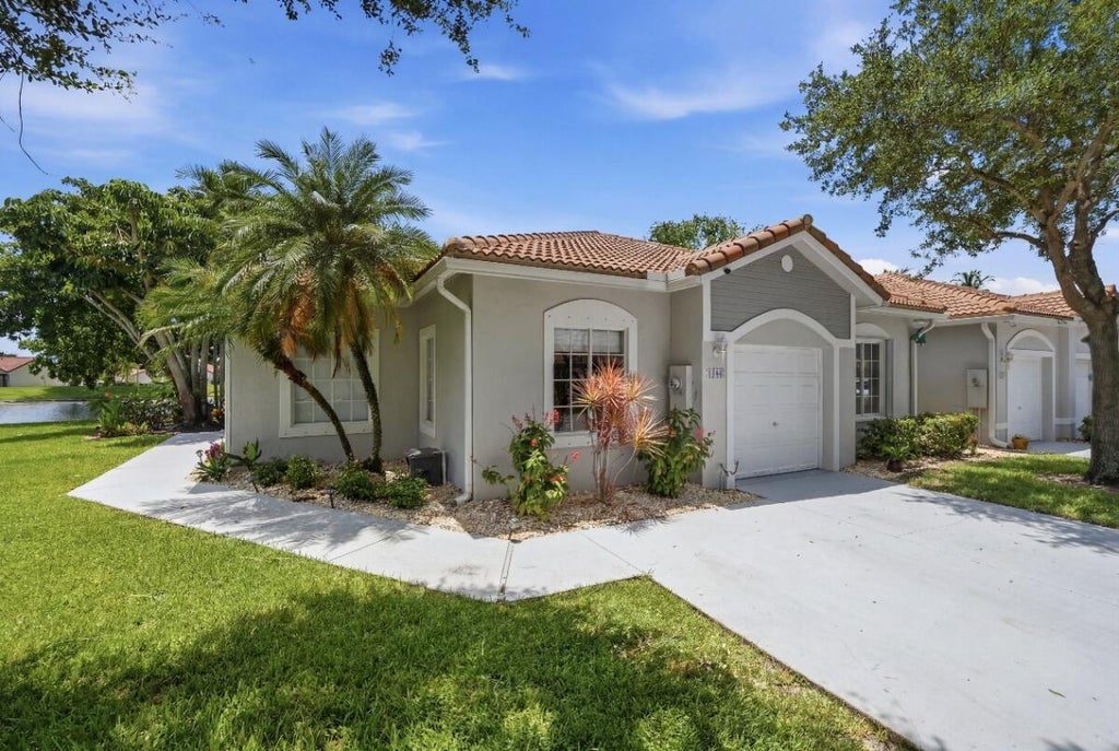 Photo of 1080 SW 42nd Avenue, Deerfield Beach, FL 33442 (MLS # B26047662)