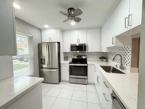 Photo of 617 Laconia Circle #B, Lake Worth, FL 33467 (MLS # B26020124)