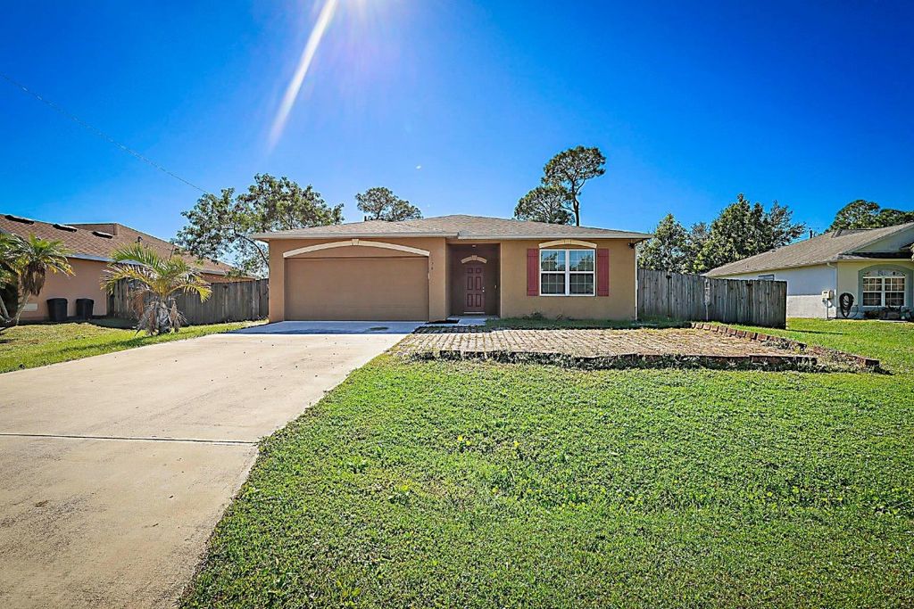 Photo of 1174 SW Goodman Avenue, Port Saint Lucie, FL 34953 (MLS # F10538693)