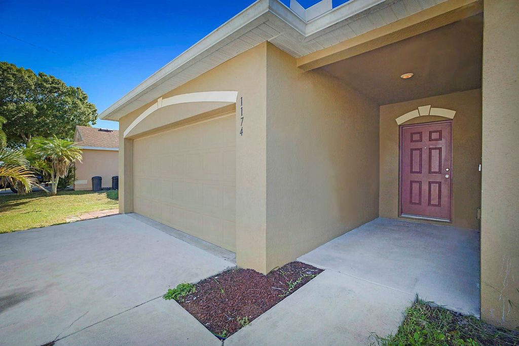 Photo of 1174 SW Goodman Avenue, Port Saint Lucie, FL 34953 (MLS # F10538693)