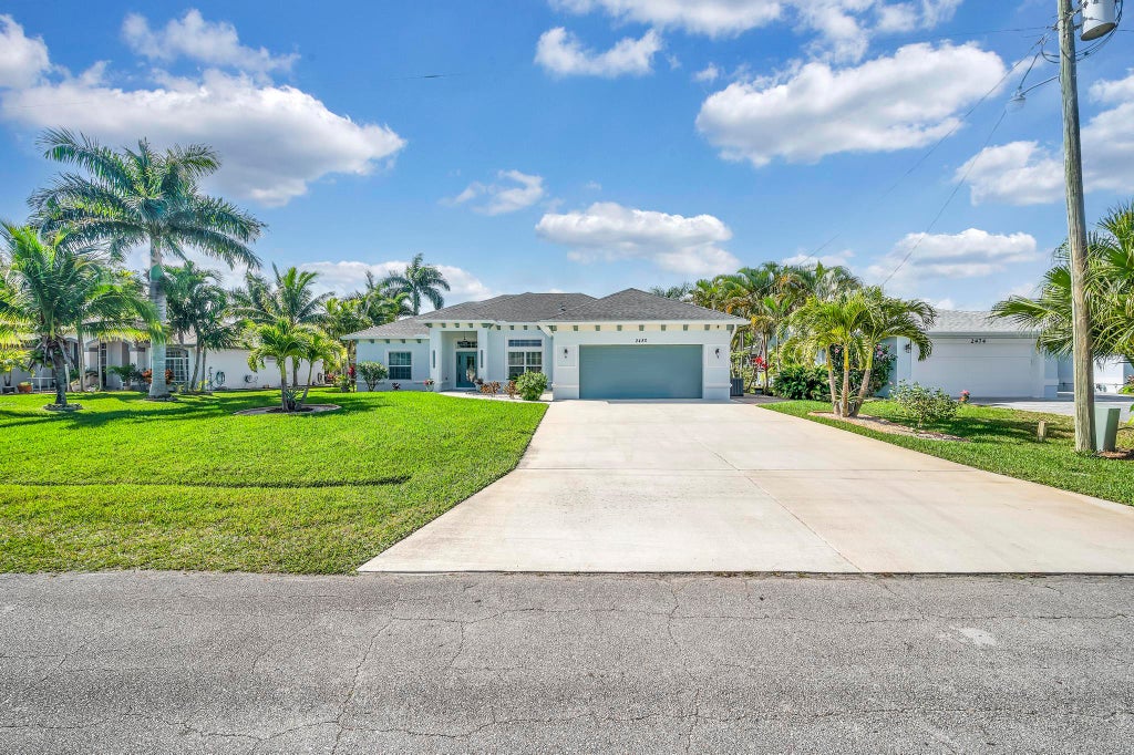 Photo of 2480 SE Marius Street, Port Saint Lucie, FL 34952 (MLS # R11004379)