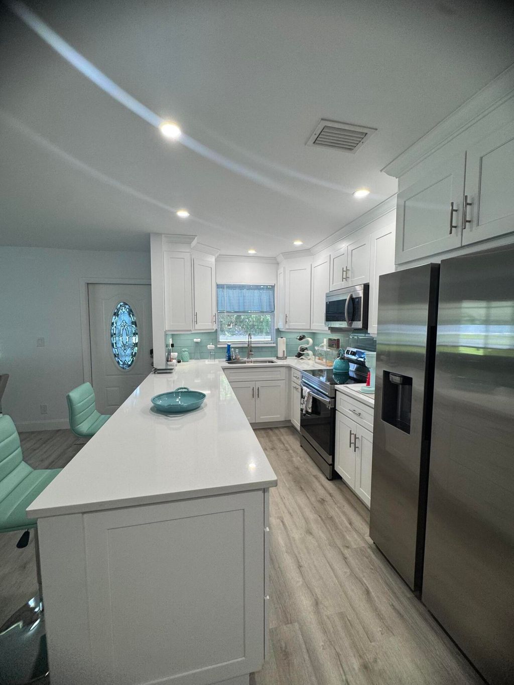 Photo of 405 High Point Boulevard, Delray Beach, FL 33445 (MLS # R11157412)