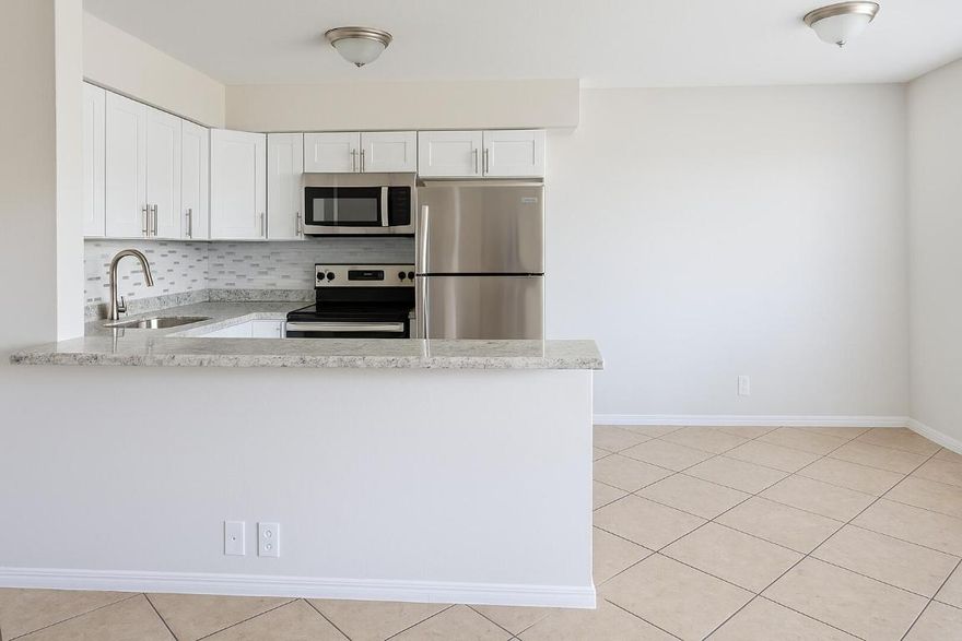 Beautiful Renovated 2 Bedroom Apartment Available for Rent! BRAND NEW VINYL FLOORING
The Villa Rica Apartment Homes are conveniently located between North Federal Highway and the Gulf Stream, and are only a 5-minute drive from the I-95 (exit 48B) and Publix Supermarket, making it the perfect location for commuters and students seeking to reside in a quiet Boca Raton neighborhood. This renovated two-bedroom apartment features brand new vinyl flooring, a renovated bathroom, updated kitchen with premium appliances, cabinetry, counter-tops, and a breakfast bar. Tenants receive free on-site parking, and all tenant's receive free pool access at 4850 NE 5th Ave, where the management office is located. Water, sewer, pest control, and waste removal are all included with the unit