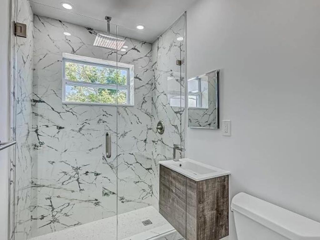 Photo of 855 Date Palm Drive, Lake Park, FL 33403 (MLS # R11167145)