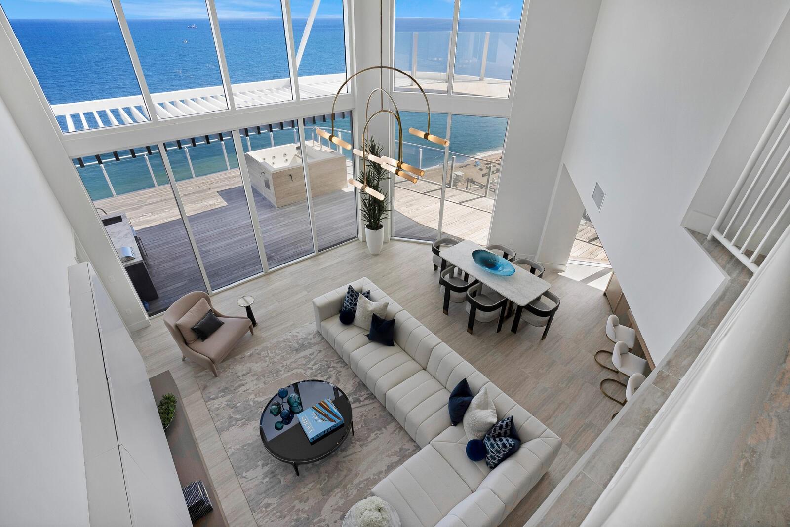 BRAND NEW, FOUR SEASONS UNIQUE 2 STORY DUPLEX RESIDENCE WITH PRIVATE ELEVATOR AND PRIVATE
JACUZZI, Seventeen floor, with 4 bedrooms, loft and 4.5 bath southeast corner direct ocean views. Dramatic 20 feet floor to ceiling glass and gracious open individual terraces afford you ample natural light throughout the home.
Gourmet kitchen with custom Italcraft lacquered cabinetry, Sub Zero and Wolf appliances, outdoor summer kitchen.
Dramatic owners retreat configuration optimizes privacy between you and your guests as well as offering additional
bedrooms with ensuite baths and an additional half bath. Abundant closet space throughout this luxury residence.
glass rails maximize your views of the ocean. Assigned parking, either self park or valet, amenity offered to all owners.