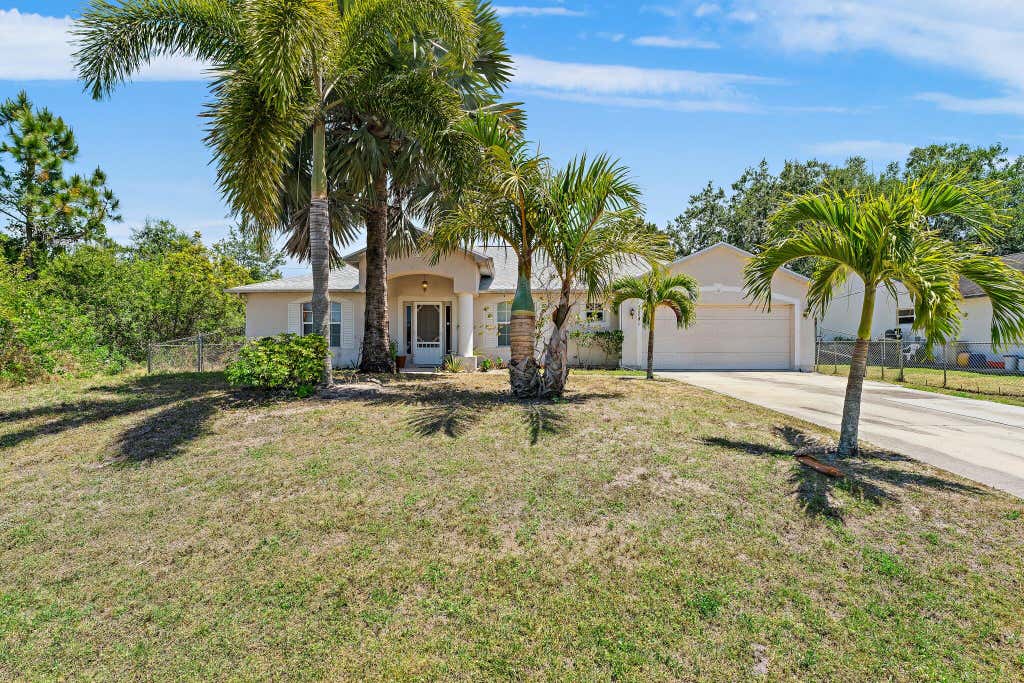 Photo of 1741 SW Bismarck Street, Port Saint Lucie, FL 34953 (MLS # R10980323)