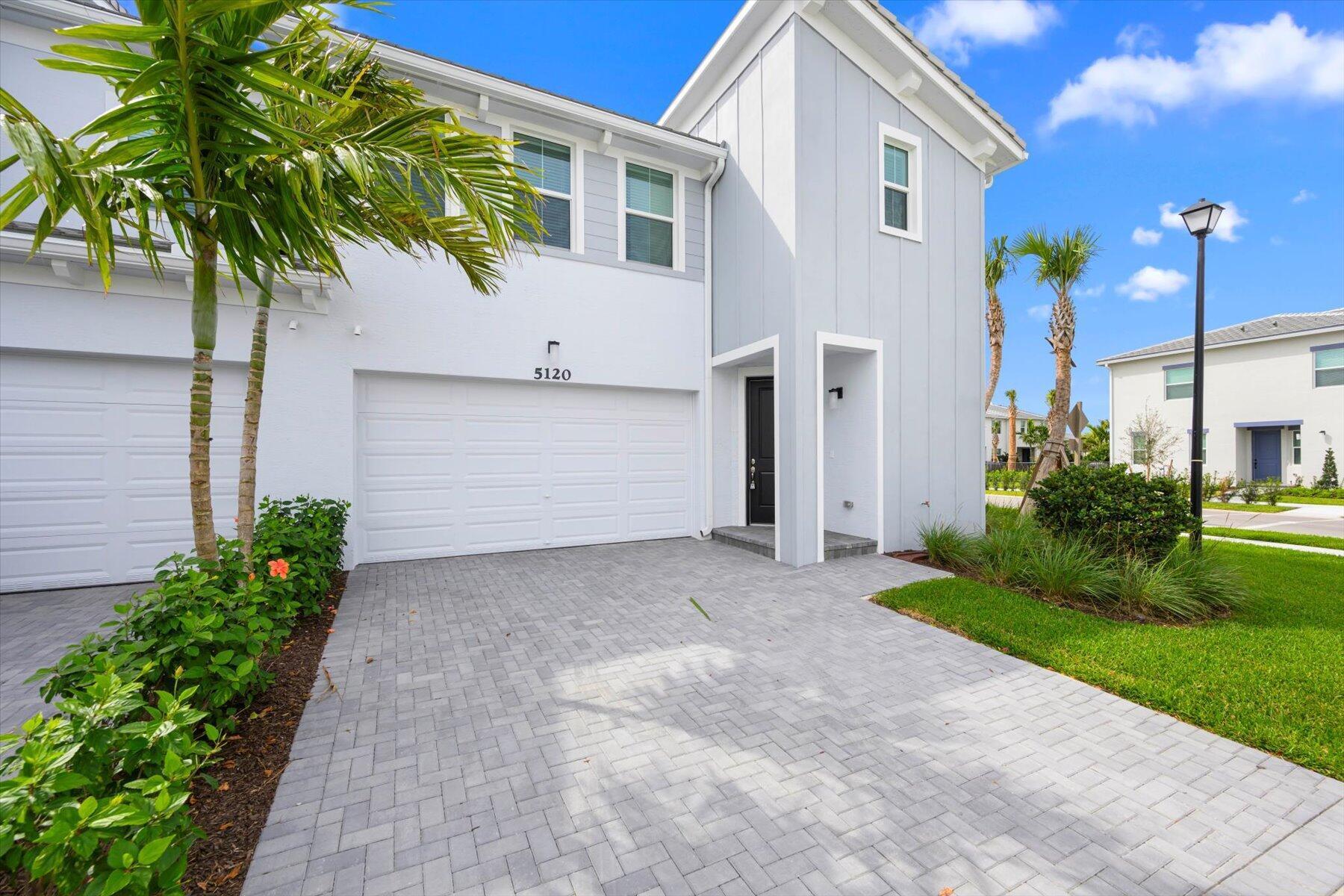 Beautiful corner end unit includes 3 bedrooms 3 baths 2 car garage. Impact windows & doors, New A/C, fenced large backyard