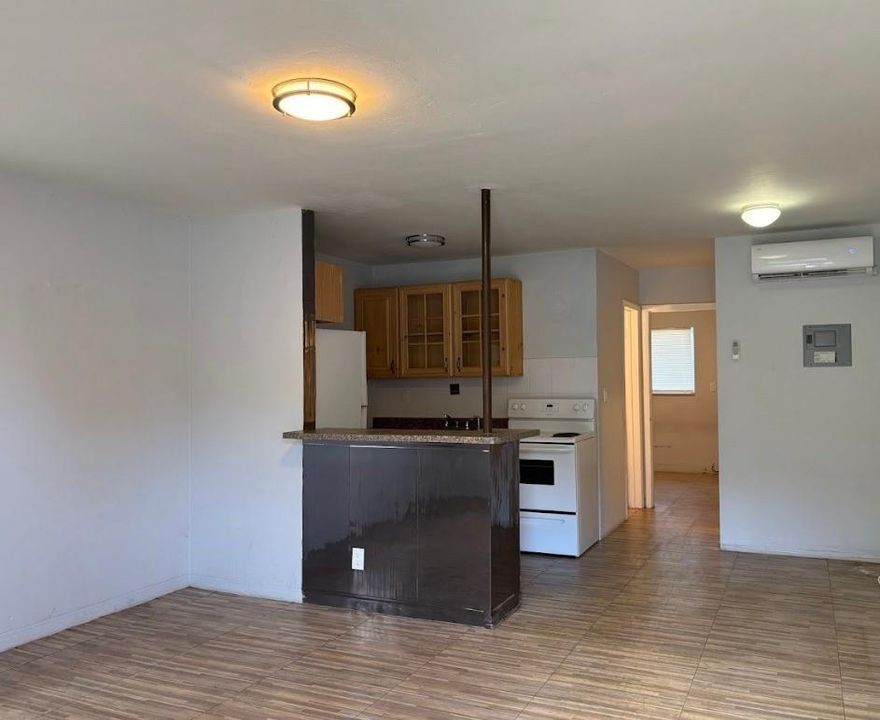 Centrally located large 1 bedroom, 1 bath apartment located in downtown Hollywood. Property & unit features newer floors, kitchen, appliances, lighting, AC and bathroom. Easy access to major highways. Utilities include water/trash, sewer & parking. Only 1st month & one month security at move-in. $17 application fee per tenant. See Broker Remarks. Housing Vouchers welcome. Schedule through MLS SHOWING TIME. EASY TO SHOW on LOCKBOX.