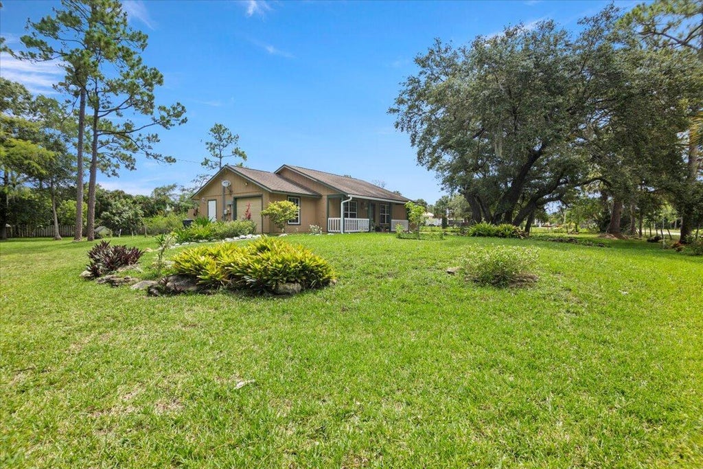 Photo of 16721 Tangerine Boulevard, Loxahatchee, FL 33470 (MLS # R10897678)