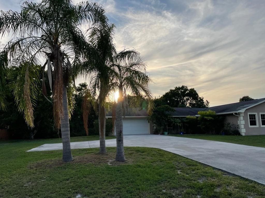 Photo of 2118 SE Morningside Boulevard, Port Saint Lucie, FL 34952 (MLS # R10802544)