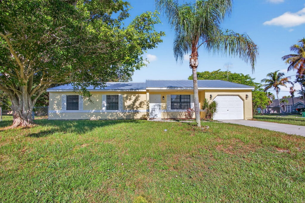 Photo of 2502 SE Calais Street, Port Saint Lucie, FL 34952 (MLS # R11116268)