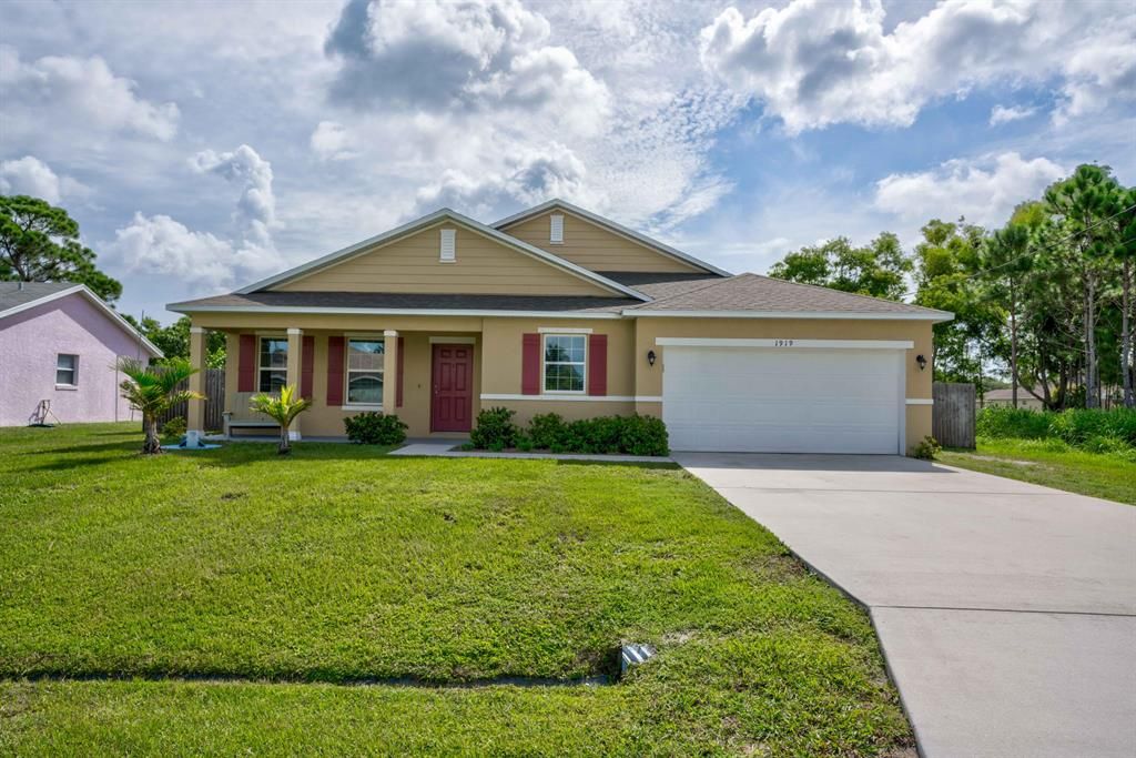 Photo of 1919 SE Bowie Street, Port Saint Lucie, FL 34952 (MLS # R10735651)