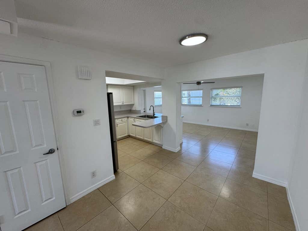 Photo of 4717 NW 49TH Place, Tamarac, FL 33319 (MLS # B26068340)