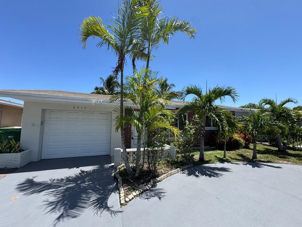 Photo of 4717 NW 49TH Place, Tamarac, FL 33319 (MLS # B26068340)