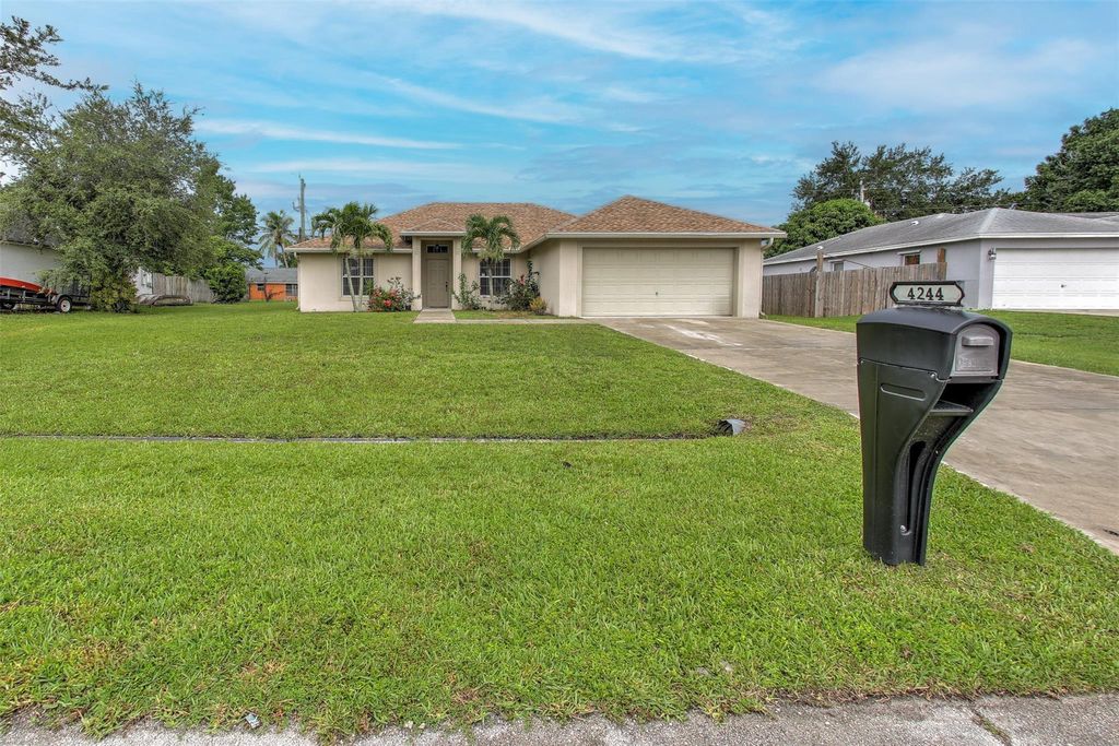 Photo of 4244 SW Elba Street, Port Saint Lucie, FL 34953 (MLS # F10514870)