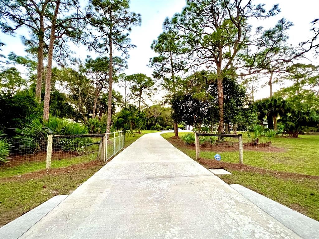 Photo of 11909 165th Road N, Jupiter, FL 33478 (MLS # R10847437)