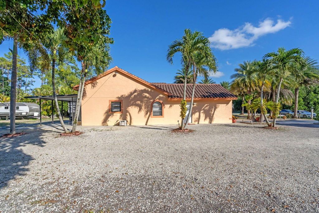 Photo of 15857 N 75th Lane N, Loxahatchee, FL 33470 (MLS # R11147332)