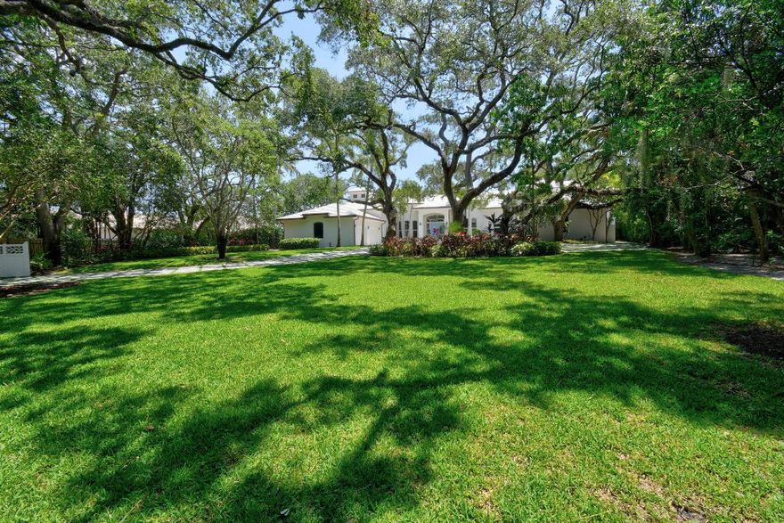 A truly unique opportunity awaits with this exceptional piece of direct intracoastal real estate in the heart of Palm Beach Gardens. Set on an elevated 1.04-acre lot, this expansive, privately gated estate has recently undergone a comprehensive renovation, designed from top to bottom by renowned interior designer Caitlin Kah Interiors, giving it a fresh, new construction feel. Surrounded by meticulously maintained mature oak trees, this remarkable waterfront retreat offers lush green views and optimal eastern exposure for a refreshing breeze. With an extremely rare 180 feet of deep-water intracoastal frontage, the property provides expansive direct intracoastal access. Fully fenced and gated with oversized back and front yards with sufficient space to add tennis/pickleball court or other expansion opportunities.

Inside, you'll find new white oak wood floors, custom cabinetry, expertly crafted lighting, wallpaper, window treatments, and finishes. The state-of-the-art chef's kitchen features top-of-the-line Wolf, Subzero, and Miele appliances, while 25-foot soaring ceilings enhance the elegance, comfort, and luxury of 2270 Wilsee Rd.

The resort-style backyard boasts a pool and spa, turf grass, coconut palms, a summer kitchen, and outdoor living spaces with stylish cypress ceilings, creating a spacious and inviting atmosphere rarely found in direct intracoastal living. Additional highlights include a brand-new roof, full home automation with a Control4 system, a 4-car garage, new floors, updated bathrooms and kitchen, impact windows, copper gutters, and more.