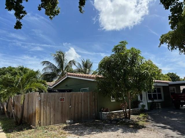 Stunning 4-Bedroom Corner Home in Pompano Beach!
Welcome to this beautifully maintained 4-bedroom, 4-bathroom Plus 2 additional bonus room in the back with their own entrance.
This Beautiful home is perfectly situated on a desirable corner lot in the heart of Pompano Beach. This spacious home features elegant marble floors throughout, impact windows for added safety and energy efficiency, and a circular driveway providing ample parking space. Enjoy the comfort of two separate air conditioning units, ensuring optimal climate control year-round. With its prime location just minutes from the beach, shopping, and dining, this home offers the perfect blend of style, convenience, and Florida living at its finest.