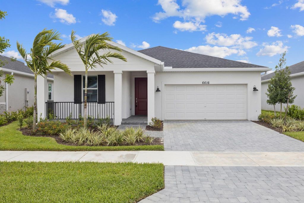 Photo of 6616 NW Cloverdale Avenue, Port Saint Lucie, FL 34987 (MLS # R11106068)