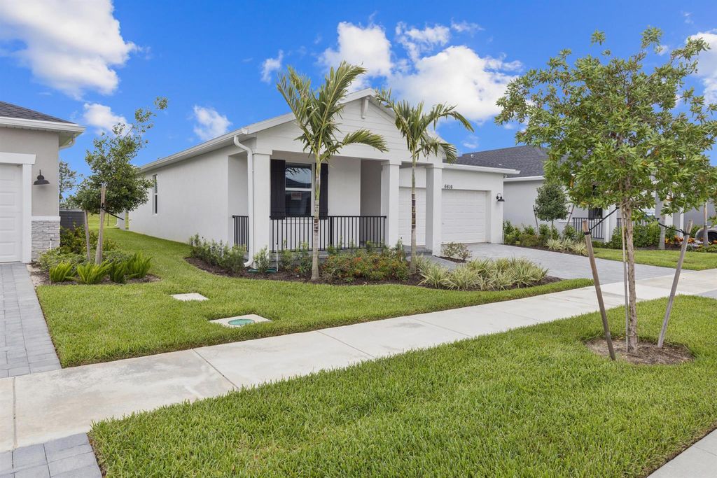 Photo of 6616 NW Cloverdale Avenue, Port Saint Lucie, FL 34987 (MLS # R11106068)