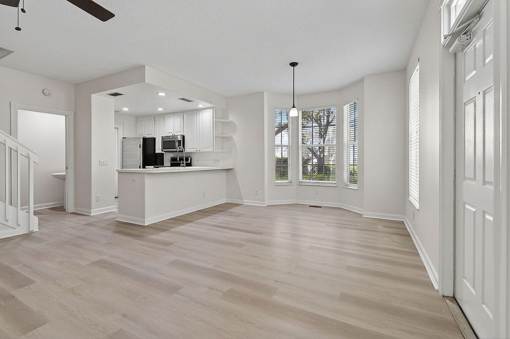 Photo of 150 Redwood Drive, Jupiter, FL 33458 (MLS # B26032810)