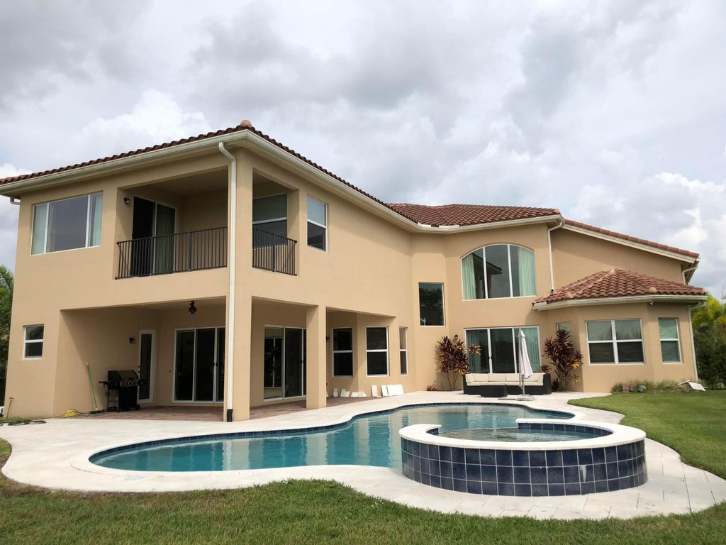 Photo of 7793 Arbor Crest Way, West Palm Beach, FL 33412 (MLS # B26018945)