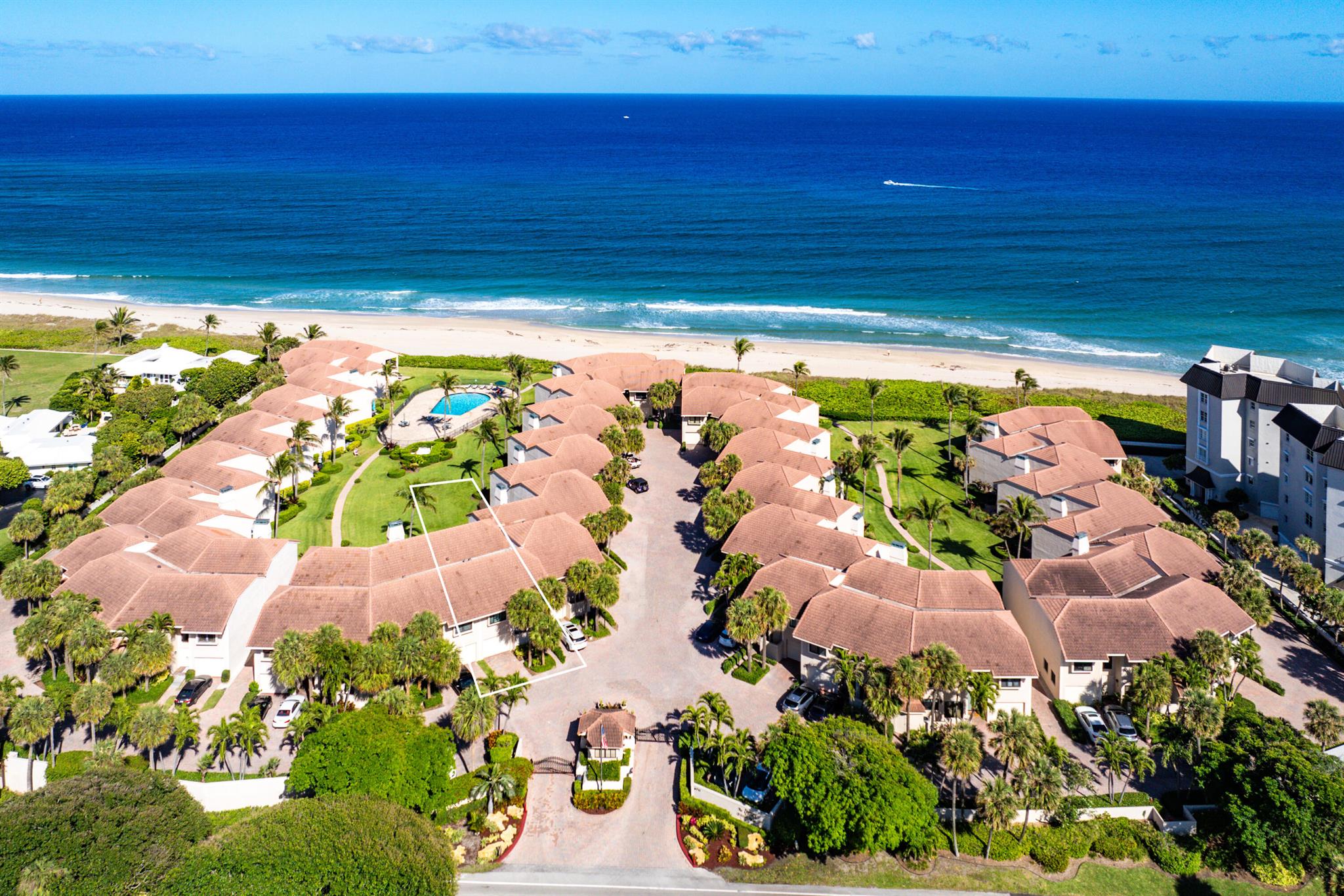 Steps from the sand! Oceanfront property with private beach access! Enjoy Carefree Living in Upscale Ocean Ridge. Located in the gated community of The Dunes, this 3000-sf townhouse with 3/BR- 2.5/BA is the perfect home to enjoy the wonderful south Florida lifestyle. From the moment you drive through the security gate onto the brick-paved courtyard drive, you'll know that careful attention has been given to every detail in this gorgeous complex.Discover a spacious open floor plan, soaring ceilings, flooded with natural light through the impact-resistant windows and doors, a one-car garage, and a newer AC system, all complemented by breathtaking ocean views. The dining area & living/family room with sliders that open up to the patio offer chic and casual coastal living.