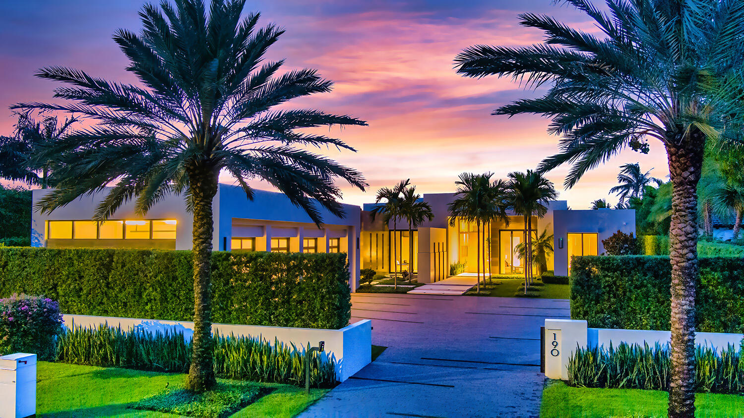 Gated High-Styled Intracoastal Estate sited along fashionable Fifth Avenue Estates amongst Boca Raton's Mansion Row by prestigious JH Norman Homes and architect Brenner Architecture Group A1A. Gated for supreme privacy, an expansive motor court greets guests to this modern, sleek one level glass encased architectural estate with high ceilings and light-infused rooms. Resort-like pool with expansive entertainment lanai and yacht dockage for up to two 80 +/- vessels mooring perpendicular, minutes to the Boca Inlet.