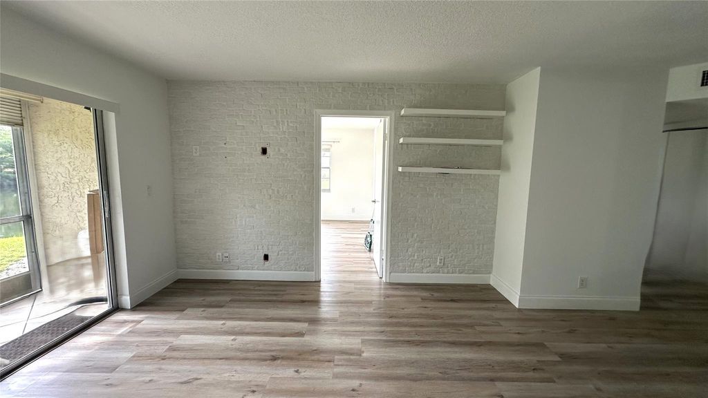 Photo of 3624 N University Dr #3624, Coral Springs, FL 33065 (MLS # F10517459)