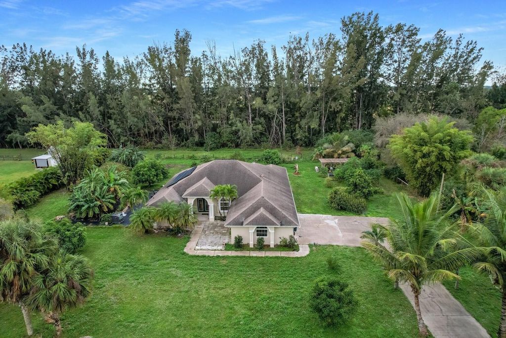 Photo of 17356 60th Lane N, Loxahatchee, FL 33470 (MLS # R10951349)