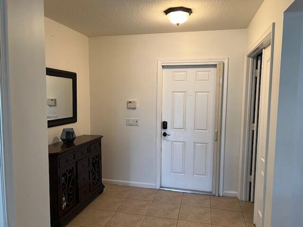 Photo of 8918 SW Caprice Circle, Stuart, FL 34997 (MLS # R11093720)